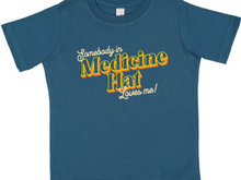 Load image into Gallery viewer, somebody in medicine hat loves me toddler t-shirt
