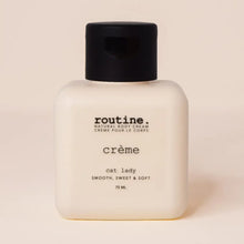 Load image into Gallery viewer, A 75 ml bottle of routine. cat lady crème natural body cream, featuring a matte off-white body and a black cap, set against a solid pale beige background.