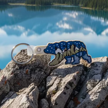 Load image into Gallery viewer, Keychain with grizzly bear and mountains that says berta