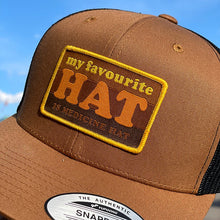 Load image into Gallery viewer, hat that says my favourite hat is medicine hat in a brown colour