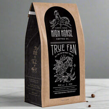 Load image into Gallery viewer, decaf coffee beans called true fan by high horse coffee co. made in alberta.