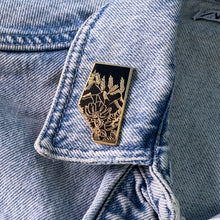 Load image into Gallery viewer, Gold and black enamel pin of Alberta

