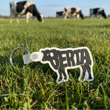 Load image into Gallery viewer, Keychain with a cow design and 'Berta' 
