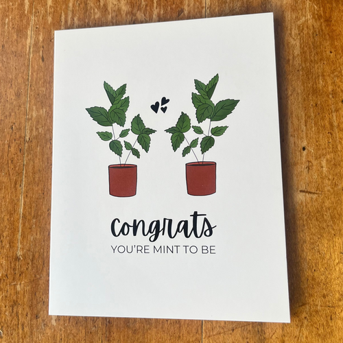 Greeting card with potted plants and 'Congrats you're mint to be' text 