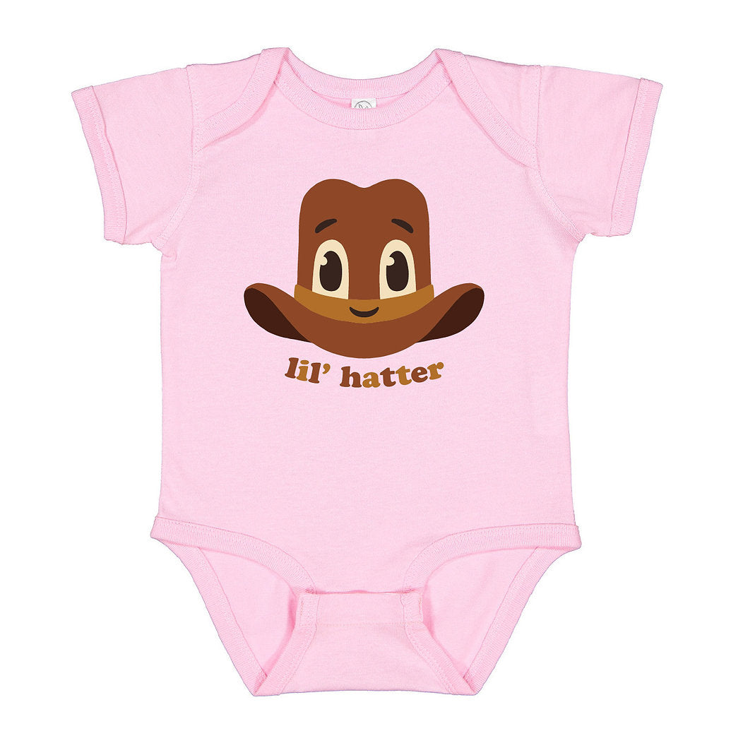 Pink baby onesie with a cartoon hat design and 'lil' hatter text