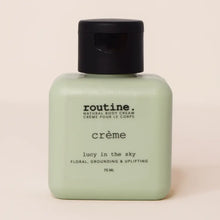 Load image into Gallery viewer, A 75ml bottle of routine. brand 'crème' natural body cream in the scent 'lucy in the sky'.

